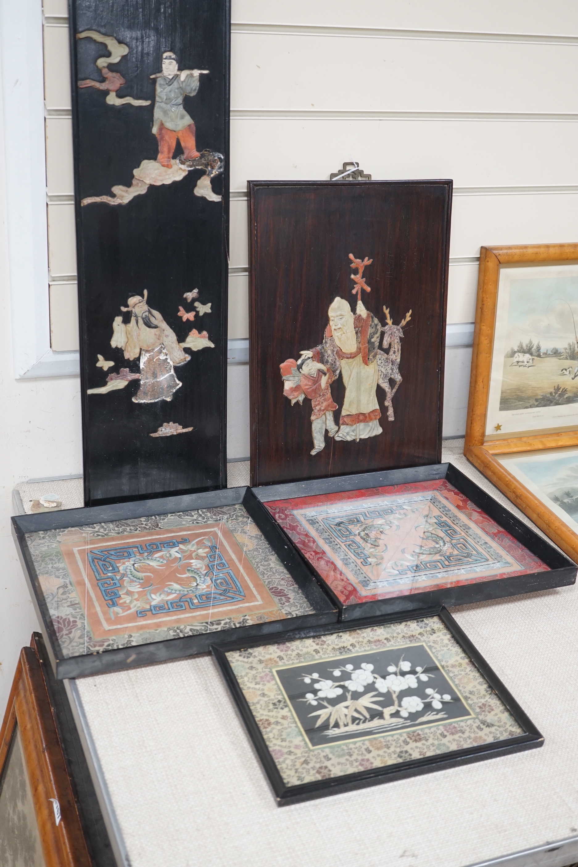 Three framed Chinese silk embroidered panels including a Beijing knot embroidered panel, two with applied butterflies, largest frame 31cm x 31cm
